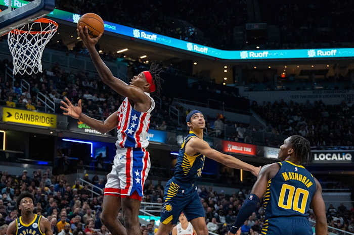 Brooklyn Nets center Day'Ron Sharpe (20) shoots the ball against Indiana Pacers guard Andrew Nembhard (2) i